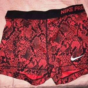 Nike spandex, red snake print